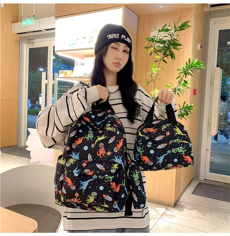 Cartoon Dinosaur Backpack with Graffiti Print Three Piece Set Large Capacity Student Backpack