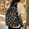 Cartoon Dinosaur Backpack with Graffiti Print Three Piece Set Large Capacity Student Backpack