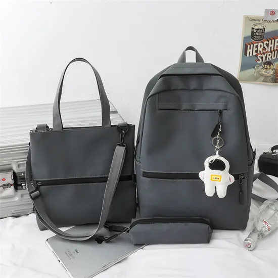 Trendy Fashionable Leather Film Large Capacity Middle School Student Three Piece Set Backpack